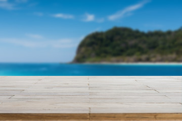 Wood table top or flooring on the beach background