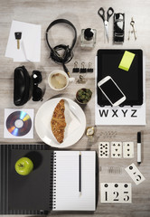Manager business tabletop with office objects on a wooden table