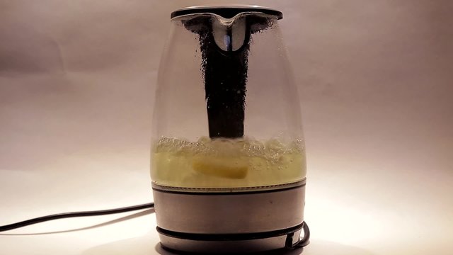 Kittle with lemon is boiling