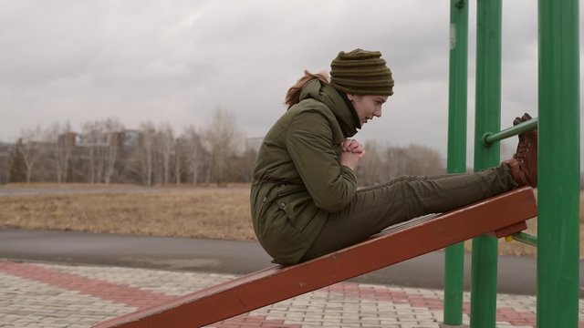 Woman doing exercise outdoors