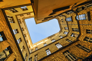 Naklejka premium The view from the bottom at the courtyard Wroclaw,