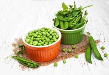 Bowls with fresh peas