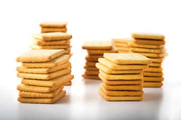 bunch of salty crackers stacked in to the pillars