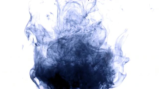 Swirling blue ink rises underwater in a glass tank, creating an abstract shape.  Looping clip, locked off, originally recorded in 4K.