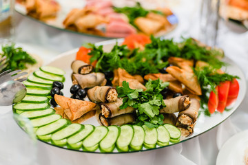 cucumbers, tomatoes, parsley and dill in the restaurant
