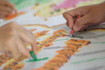 Fototapeta premium Crayons lying on an abstract