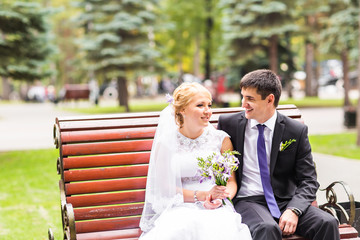 Just married couple embraced