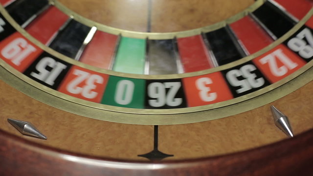 Casino: Roulette in motion, ball stops at black thirteen