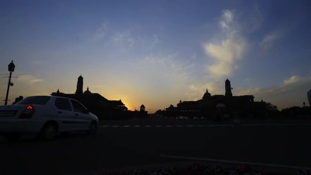 Fast motion shot of traffic moving in front of the Rashtrapati Bhavan, New Delhi, India 