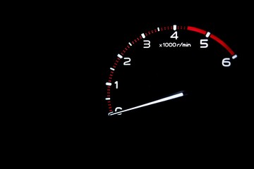 Fototapeta premium driver's cockpit ; tachometer on dashboard - white light in black and copy space 
