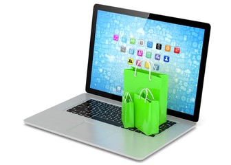 laptop and  shopping pags on white background. 3D rendering.