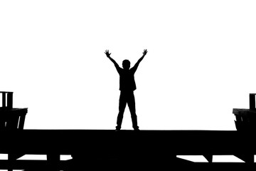 man raise his hand in black and white