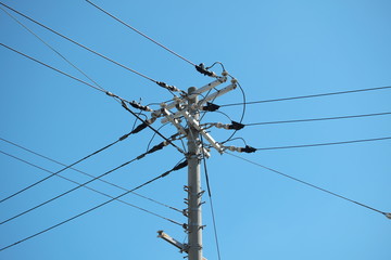 Transmission lines in the blue sky