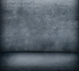 The gray concrete wall and floor close up