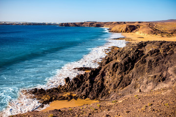 Papagayo beach near Las Coloradas resort on the south of Lanzarote island in Spain
