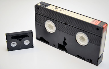 VHS and Mini DV video tapes, technology and vintage concept