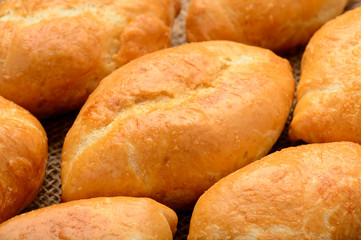 Traditional  russian pastry piroshki as background.