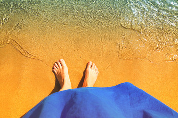 female legs with sea