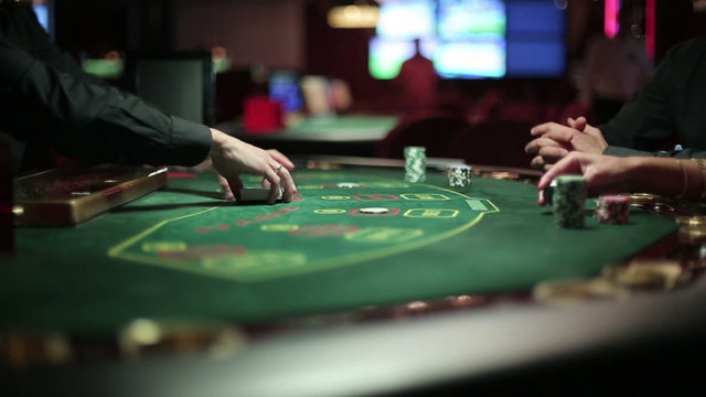 People playing poker in casino