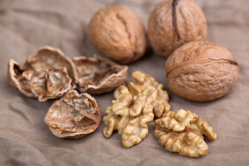 Walnut without shell close-up, and nuts in the shell