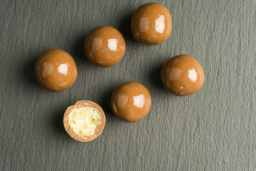 chocolate balls on a black background