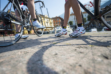 road cycling detail wheel and shoes