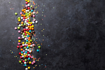 Colorful candies over stone