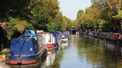 Little venice canals and barges on a sunny day.