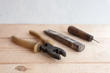 old tools on a wooden table
