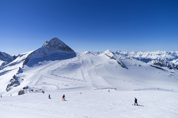 Ski slops on the top of the glacier in the  Alps.