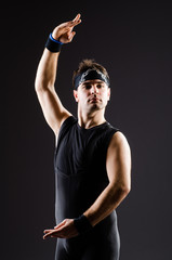 Young man training for ballet dances
