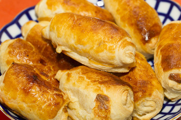 Beautiful, red-cheeked, golden pastries - croissants and puff pa