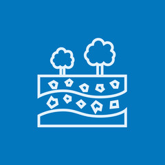 Cut of soil with different layers and trees on top line