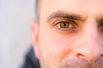 Man's eye looking at camera