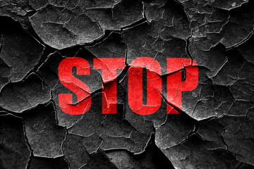 Grunge cracked stop sign background