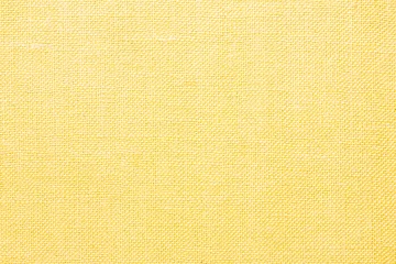 Afwasbaar Fotobehang Stof Yellow linen fabric closeup texture.