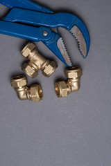 Adjustable wrench and connection fittings