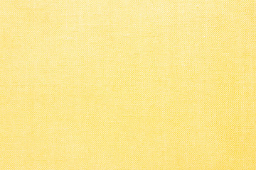 Yellow linen fabric closeup texture.