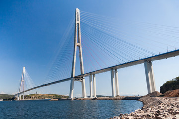 Fototapeta na wymiar Suspension Russkiy Bridge seen from Russkiy island in Vladivostok, Russia