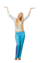 Young woman wearing blue training pants isolated on white