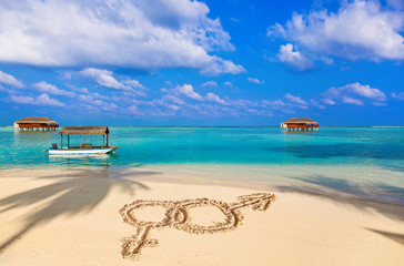 Sex symbols on beach