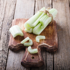 Fototapeta na wymiar Celery,chopped on a wooden Board.selective focus