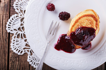 Pancakes with BlackBerry jam.selective focus.