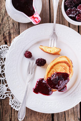 Pancakes with BlackBerry jam.selective focus.