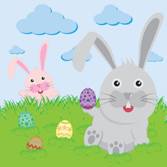 Easter bunny playful with painted eggs