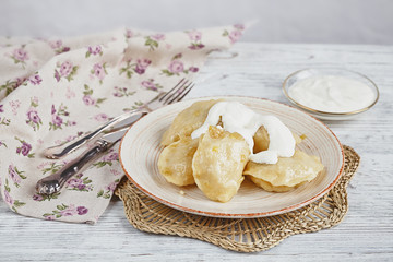 Vareniki with onion and sour cream