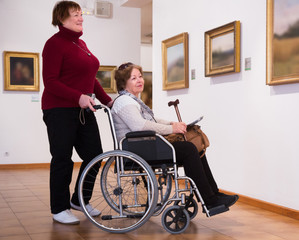 Two woman in art gallery