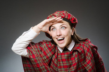 Woman wearing traditional scottish clothing