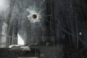 Bullet Hole in Vehicle Window