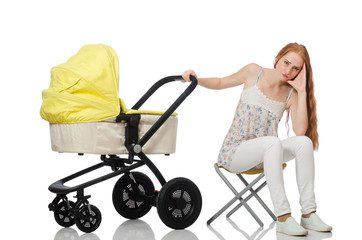 Woman with baby and pram isolated on white